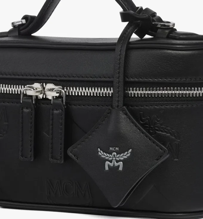 Trousse Aren in pelle con motivo Maxi Monogram