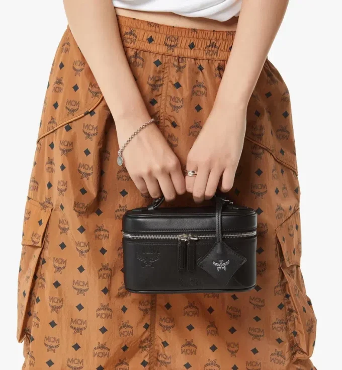 Trousse Aren in pelle con motivo Maxi Monogram